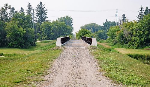 MIKE DEAL / WINNIPEG FREE PRESS
The footbridge which used to be a railway that crosses the Icelandic River in Arborg, MB.
230731 - Monday, July 31, 2023.