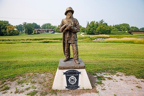 MIKE DEAL / WINNIPEG FREE PRESS
A statue dedicated to the Arborg-Bifrost Fire and Emergency Services sits in a park along the Icelandic River in Arborg, MB.
230731 - Monday, July 31, 2023.