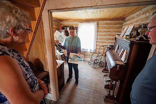 MIKE DEAL / WINNIPEG FREE PRESS
Emma Sigvaldason conducts a tour, stopping at the Vigfusson House in the Arborg &amp; District Multicultural Heritage Village in Arborg, MB.
230731 - Monday, July 31, 2023.