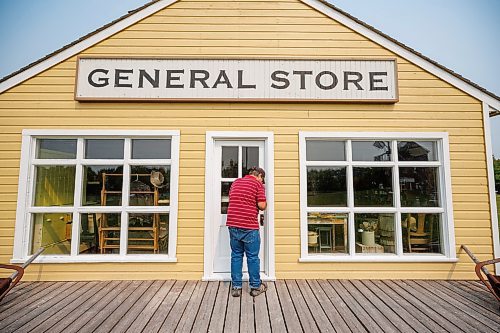 MIKE DEAL / WINNIPEG FREE PRESS
Longtime volunteer, Joe Stoyanowski unlocks the General Store which he designed based on elements from former general stores in the area in the Arborg &amp; District Multicultural Heritage Village in Arborg, MB.
230731 - Monday, July 31, 2023.