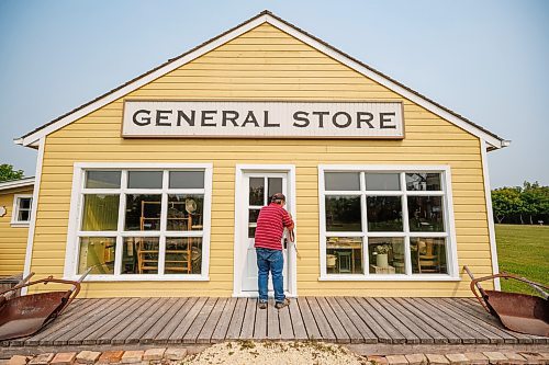 MIKE DEAL / WINNIPEG FREE PRESS
Longtime volunteer, Joe Stoyanowski unlocks the General Store which he designed based on elements from former general stores in the area in the Arborg &amp; District Multicultural Heritage Village in Arborg, MB.
230731 - Monday, July 31, 2023.