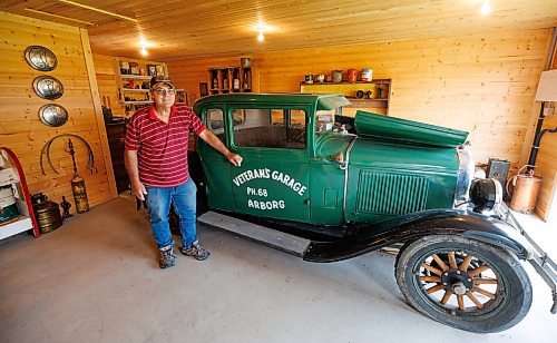 MIKE DEAL / WINNIPEG FREE PRESS
Longtime volunteer, Joe Stoyanowski in the garage at the back of the General Store which he designed based on elements from former general stores in the area. It houses many of his fathers items including his dads truck. The Arborg &amp; District Multicultural Heritage Village in Arborg, MB.
230731 - Monday, July 31, 2023.