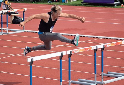 Mike Thiessen / Winnipeg Free Press 
Jerome Cadoret Millet of Strasbourg, France, competes in the men's 50-54 age bracket in the World Police and Fire Games hurdles event. 230801 – Tuesday, August 1, 2023