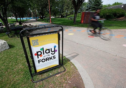 JOHN WOODS / WINNIPEG FREE PRESS
People use a walkway which is part of the Play At The Forks program at The Forks in Winnipeg, Tuesday, August 1, 2023. 

Reporter: