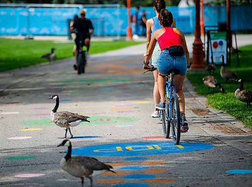 JOHN WOODS / WINNIPEG FREE PRESS
People use a walkway which is part of the Play At The Forks program at The Forks in Winnipeg, Tuesday, August 1, 2023. 

Reporter: