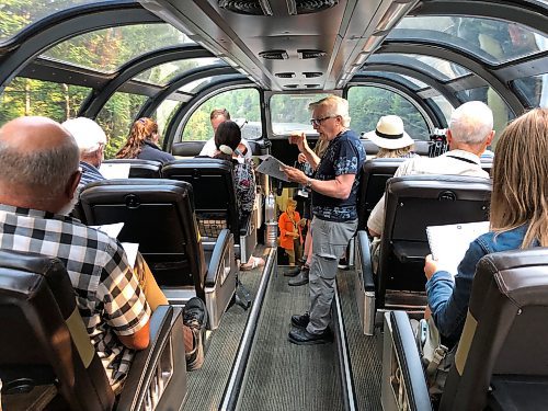 JOHN LONGHURST / WINNIPEG FREE PRESS
Retired Winnipeg choral conductor Henry Engbrecht leads the singing in the dome car of Via Rail’s train, The Canadian, during the Memories of Migration: Russlaender 100 rail journey from Quebec City to Vancouver from July 6-24.