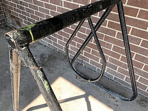 ERIK PINDERA / WINNIPEG FREE PRESS

A damaged bike rack at Dominion Centre in St. Boniface on Wednesday.  August 2, 2023