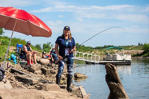 MIKAELA MACKENZIE / WINNIPEG FREE PRESS

Tara Singleton competes in angling for catfish in the World Police and Fire Games at Lockport on Wednesday, Aug. 2, 2023. For &#x2014; story.
Winnipeg Free Press 2023