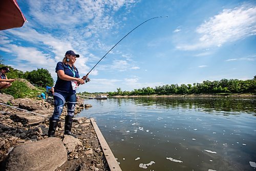 MIKAELA MACKENZIE / WINNIPEG FREE PRESS

Tara Singleton competes in angling for catfish in the World Police and Fire Games at Lockport on Wednesday, Aug. 2, 2023. For &#x2014; story.
Winnipeg Free Press 2023