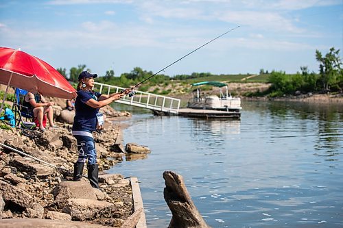 MIKAELA MACKENZIE / WINNIPEG FREE PRESS

Tara Singleton competes in angling for catfish in the World Police and Fire Games at Lockport on Wednesday, Aug. 2, 2023. For &#x2014; story.
Winnipeg Free Press 2023