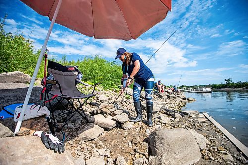 MIKAELA MACKENZIE / WINNIPEG FREE PRESS

Tara Singleton competes in angling for catfish in the World Police and Fire Games at Lockport on Wednesday, Aug. 2, 2023. For &#x2014; story.
Winnipeg Free Press 2023