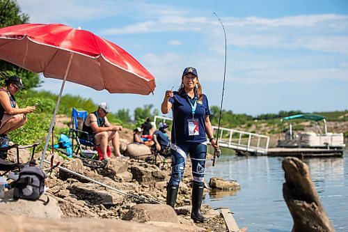 MIKAELA MACKENZIE / WINNIPEG FREE PRESS

Tara Singleton competes in angling for catfish in the World Police and Fire Games at Lockport on Wednesday, Aug. 2, 2023. For &#x2014; story.
Winnipeg Free Press 2023