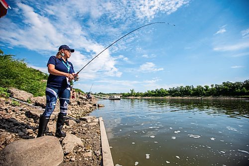 MIKAELA MACKENZIE / WINNIPEG FREE PRESS

Tara Singleton competes in angling for catfish in the World Police and Fire Games at Lockport on Wednesday, Aug. 2, 2023. For &#x2014; story.
Winnipeg Free Press 2023