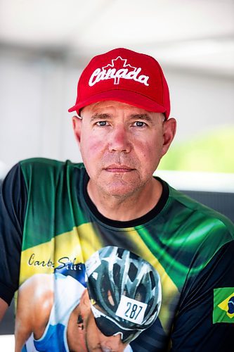 MIKAELA MACKENZIE / WINNIPEG FREE PRESS

Darrell Hees poses for a photo at the cycling headquarters at the World Police and Fire Games in Bird&#x2019;s Hill Park on Wednesday, Aug. 2, 2023. For Josh story.
Winnipeg Free Press 2023