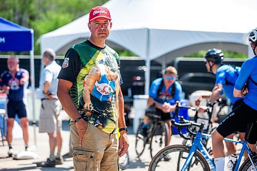 MIKAELA MACKENZIE / WINNIPEG FREE PRESS

Darrell Hees poses for a photo at the cycling headquarters at the World Police and Fire Games in Bird&#x2019;s Hill Park on Wednesday, Aug. 2, 2023. For Josh story.
Winnipeg Free Press 2023