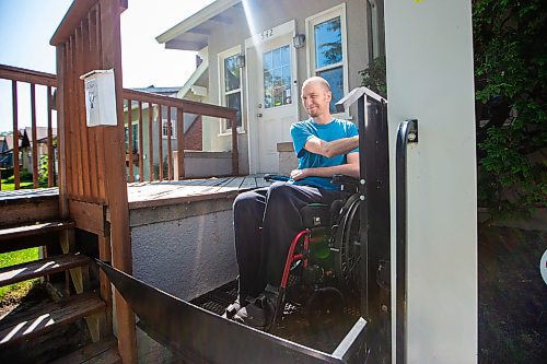 MIKAELA MACKENZIE / WINNIPEG FREE PRESS

Mitch Krohn, a Transit Plus rider, wheels to the pad in front of his house where he waits (often for hours) on Wednesday, Aug. 2, 2023. For Joyanne story.
Winnipeg Free Press 2023