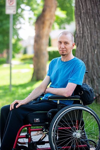 MIKAELA MACKENZIE / WINNIPEG FREE PRESS

Mitch Krohn, a Transit Plus rider, in front of his house where he waits (often for hours) on Wednesday, Aug. 2, 2023. For Joyanne story.
Winnipeg Free Press 2023