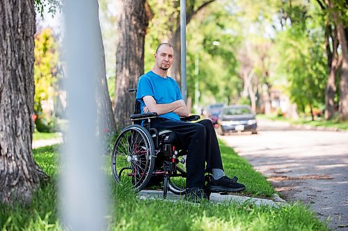 MIKAELA MACKENZIE / WINNIPEG FREE PRESS

Mitch Krohn, a Transit Plus rider, in front of his house where he waits (often for hours) on Wednesday, Aug. 2, 2023. For Joyanne story.
Winnipeg Free Press 2023