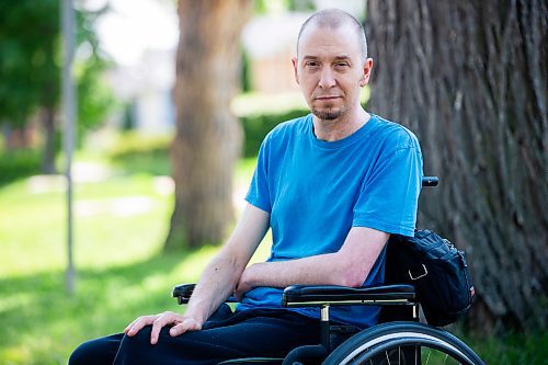 MIKAELA MACKENZIE / WINNIPEG FREE PRESS

Mitch Krohn, a Transit Plus rider, in front of his house where he waits (often for hours) on Wednesday, Aug. 2, 2023. For Joyanne story.
Winnipeg Free Press 2023