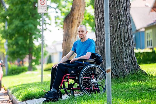 MIKAELA MACKENZIE / WINNIPEG FREE PRESS

Mitch Krohn, a Transit Plus rider, in front of his house where he waits (often for hours) on Wednesday, Aug. 2, 2023. For Joyanne story.
Winnipeg Free Press 2023