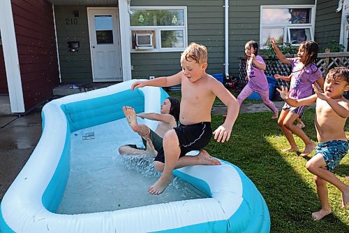 02082023
Kids keep cool while playing in an inflatable pool in Brandon&#x2019;s east end on a scorching hot Wednesday.  (Tim Smith/The Brandon Sun)