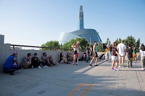 Mike Thiessen / Winnipeg Free Press 
Even in the 32&#x2103; heat, plenty of people came out for the outdoor dance sessions on the roof of the Forks parkade, hosted by Eugene &#x201c;Genie&#x201d; Bafoe and Marvin Joseph &#x201c;bboy majo&#x201d; Barawid. For Eva Wasney. 230802 &#x2013; Wednesday, August 2, 2023