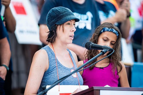 MIKAELA MACKENZIE / WINNIPEG FREE PRESS

Autumn Hartle speaks at a rally calling for higher wages at the Manitoba Legislature on Thursday, Aug. 3, 2023. For Malak Abas story.
Winnipeg Free Press 2023