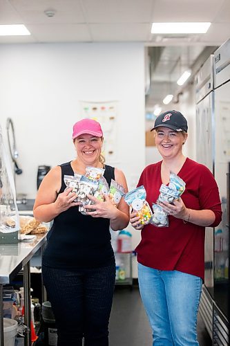 MIKAELA MACKENZIE / WINNIPEG FREE PRESS

Sydney Gervais, owner of the Polar Shoppe (right), and her mom Jennifer Lukacs at the commercial kitchen where they freeze-dry the candy on Wednesday, Aug. 2, 2023. For Dave Sanderson story.
Winnipeg Free Press 2023