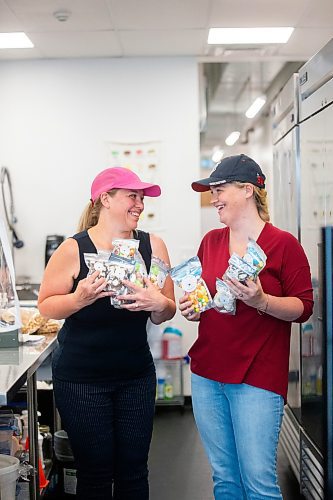 MIKAELA MACKENZIE / WINNIPEG FREE PRESS

Sydney Gervais, owner of the Polar Shoppe (right), and her mom Jennifer Lukacs at the commercial kitchen where they freeze-dry the candy on Wednesday, Aug. 2, 2023. For Dave Sanderson story.
Winnipeg Free Press 2023