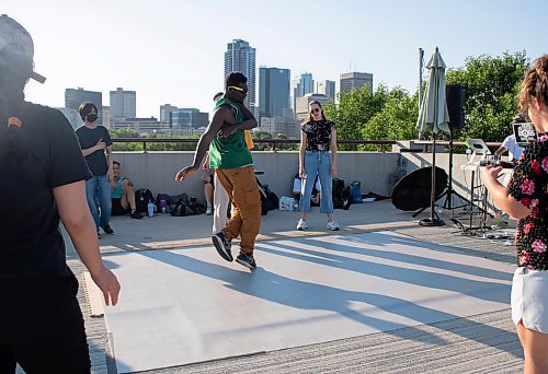 Mike Thiessen / Winnipeg Free Press 
Eugene &#x201c;Genie&#x201d; Bafoe (centre) is one of the hosts of a weekly outdoor dance session at the Forks. The sessions will run through the remainder of the summer. For Eva Wasney. 230802 &#x2013; Wednesday, August 2, 2023