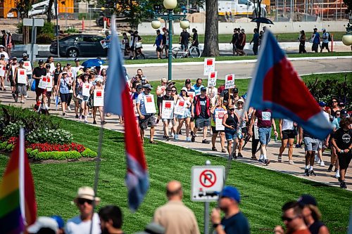 MIKAELA MACKENZIE / WINNIPEG FREE PRESS

MGEU members rally for higher wages at the Manitoba Legislature on Thursday, Aug. 3, 2023. For Malak Abas story.
Winnipeg Free Press 2023