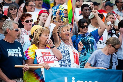 MIKAELA MACKENZIE / WINNIPEG FREE PRESS

MGEU members rally for higher wages at the Manitoba Legislature on Thursday, Aug. 3, 2023. For Malak Abas story.
Winnipeg Free Press 2023