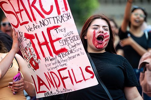 MIKAELA MACKENZIE / WINNIPEG FREE PRESS

Tristina Houle at a round dance calling for the landfills to be searched at Portage and Main on Thursday, Aug. 3, 2023. For Tessa story.
Winnipeg Free Press 2023