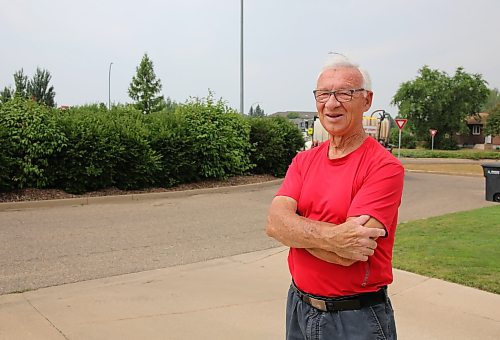 Brandonite Howard Coates stands in front of the traffic circle on Maryland Avenue on Friday. Coates, who has lived in the area for 40 years, says he’s “very much aware of the increase in traffic and the hazards for kids.” (Michele McDougall/The Brandon Sun)

