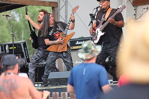 Members of The B34ST, a Mexican rock band hailing from Puerto Vallarta, throw down on the Heritage Co-op Hilltop Stage during the first day of this year’s Rockin’ the Fields of Minnedosa festival. (Kyle Darbyson/The Brandon Sun)