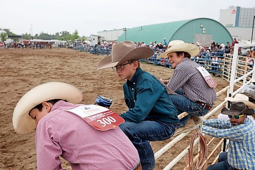 04082023
Young cowboys watch the High School Saddle Bronc Riding event at the Canadian High School Finals Rodeo at the Keystone Centre in Brandon on Friday. The rodeo continues today.
(Tim Smith/The Brandon Sun)