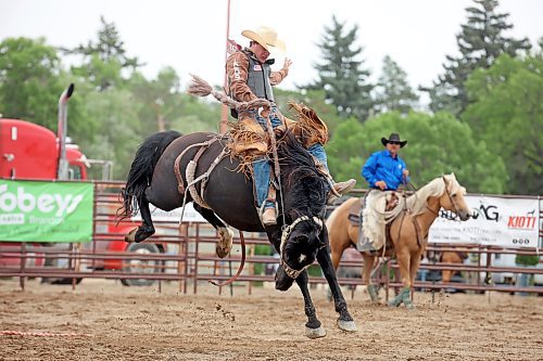 04082023
Samuel Flaherty tries to hold on during the High School Saddle Bronc Riding event at the Canadian High School Finals Rodeo at the Keystone Centre in Brandon on Friday. The rodeo continues today.
(Tim Smith/The Brandon Sun)