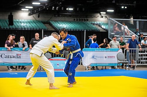 MIKAELA MACKENZIE / WINNIPEG FREE PRESS

Gerardo Galaviz (left, Californian police) and Sebastian Botero (Vancouver CBSA) compete in jiu jistu at the World Police and Fire Games at the RBC Convention Centre on Friday, Aug. 4, 2023. For &#x460;story.
Winnipeg Free Press 2023