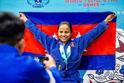 MIKAELA MACKENZIE / WINNIPEG FREE PRESS

Cambolidan police jiu jitsu team member Nuth Sreyroth poses for a photo at the World Police and Fire Games at the RBC Convention Centre on Friday, Aug. 4, 2023. For &#x460;story.
Winnipeg Free Press 2023