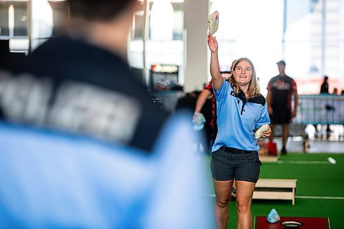 MIKAELA MACKENZIE / WINNIPEG FREE PRESS

German police ofiicer Lisa-Marie Walz warms up for the cornhole competition with her team member, Pauline Hein, at the World Police and Fire Games at the RBC Convention Centre on Friday, Aug. 4, 2023. For &#x460;story.
Winnipeg Free Press 2023