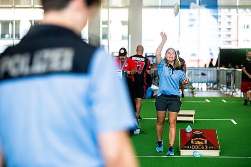 MIKAELA MACKENZIE / WINNIPEG FREE PRESS

German police ofiicer Lisa-Marie Walz warms up for the cornhole competition with her team member, Pauline Hein, at the World Police and Fire Games at the RBC Convention Centre on Friday, Aug. 4, 2023. For &#x460;story.
Winnipeg Free Press 2023