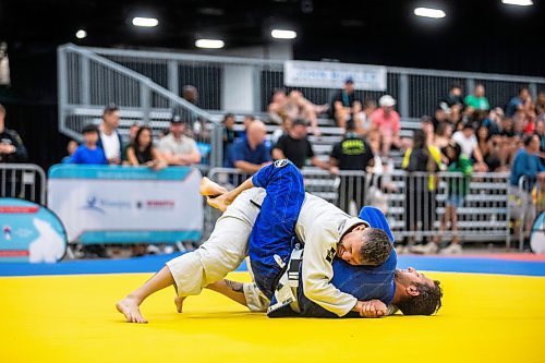 MIKAELA MACKENZIE / WINNIPEG FREE PRESS

Gerardo Galaviz (top, Californian police) and Sebastian Botero (Vancouver CBSA) compete in jiu jistu at the World Police and Fire Games at the RBC Convention Centre on Friday, Aug. 4, 2023. For &#x460;story.
Winnipeg Free Press 2023