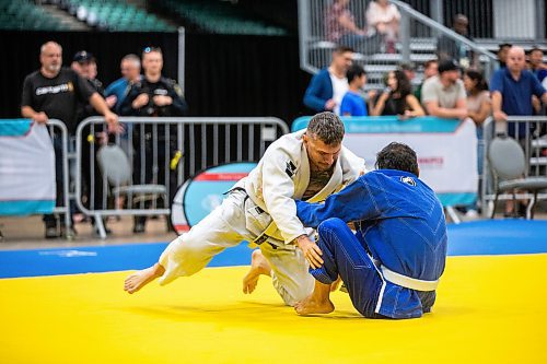 MIKAELA MACKENZIE / WINNIPEG FREE PRESS

Gerardo Galaviz (left, Californian police) and Sebastian Botero (Vancouver CBSA) compete in jiu jistu at the World Police and Fire Games at the RBC Convention Centre on Friday, Aug. 4, 2023. For &#x460;story.
Winnipeg Free Press 2023