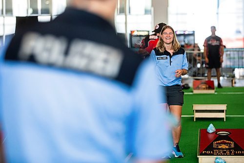 MIKAELA MACKENZIE / WINNIPEG FREE PRESS

German police ofiicer Lisa-Marie Walz warms up for the cornhole competition with her team member, Pauline Hein, at the World Police and Fire Games at the RBC Convention Centre on Friday, Aug. 4, 2023. For &#x460;story.
Winnipeg Free Press 2023