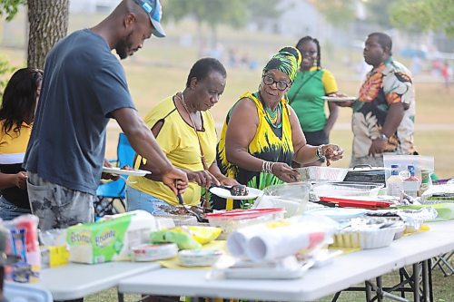Members of Brandon’s Jamaican community take part in a potluck at Rideau Park Sunday to celebrate Jamaican independence. (Kyle Darbyson/The Brandon Sun)