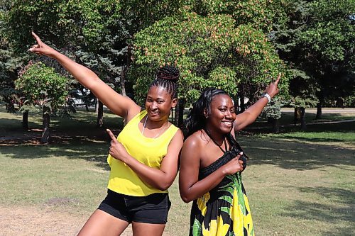 Rushanan Newman and Tashiba Henlon strike a victory pose made famous by Jamaican sprinter Usain Bolt during Sunday’s Independence Day festivities at Rideau Park. (Kyle Darbyson/The Brandon Sun)