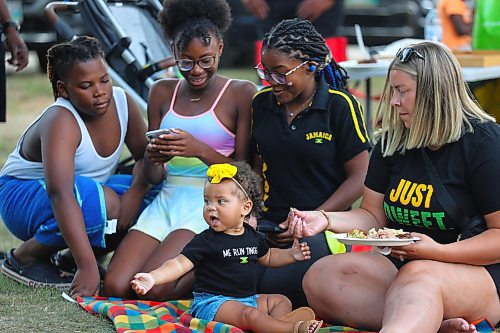 Eleven-month-old Mila Brown enjoys the company of family and friends during local Jamaica Independence Day festivities that took place at Rideau Park over the weekend. (Kyle Darbyson/The Brandon Sun)