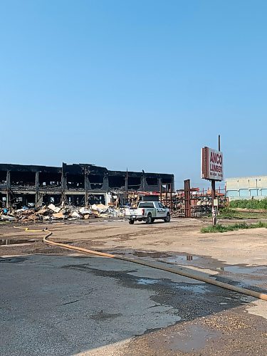 Cierra Bettens / Winnipeg Free Press
Crews were called to the scene at 1:36 a.m. Sunday Aug. 6 after hearing reports about a large commercial fire on the 900 block of Logan Avenue, where Anco Lumber is stationed. Aug. 7, 2023