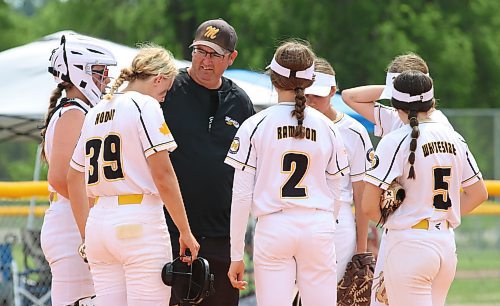 Westman Magic head coach Marc Lyver, shown discussing an in-game situation with, from left to right, catcher Alexa Banga, Presley Hodson (39), Paige Rampton (2), Brynna Andrew, Jayce Whiteside (5) and the hidden Mya Duncan-Gagnon, found his way behind the bench to stay in a game he loves. (Perry Bergson/The Brandon Sun)
Aug. 8, 2023
