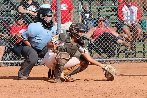 Akayla Veysey, shown behind the plate as Westman Magic catcher Kaylee Rank scoops up the ball, is in her eighth year as an umpire. (Perry Bergson/The Brandon Sun)
Aug. 10, 2023